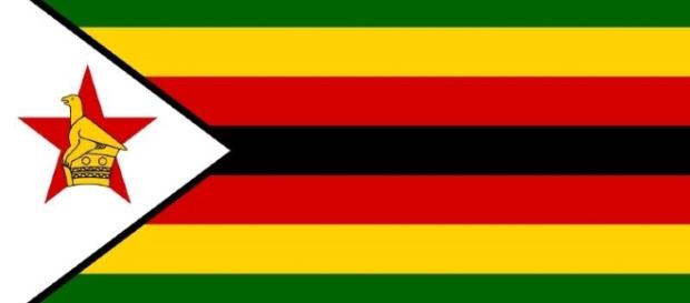 The Zimbabwe national flag / Image via public domain Wikimedia. The Zimbabwe national flag / Image via public domain Wikimedia.