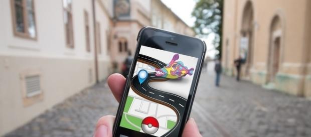 Playing the Pokemon Go app while hitting the streets. Playing the Pokemon Go app while hitting the streets.