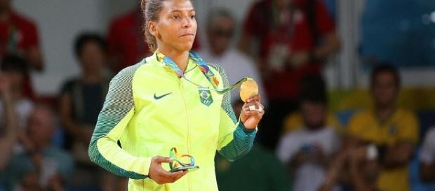 Rafaela Silva ganha o primeiro ouro do Brasil - com.br Rafaela Silva ganha o primeiro ouro do Brasil - com.br