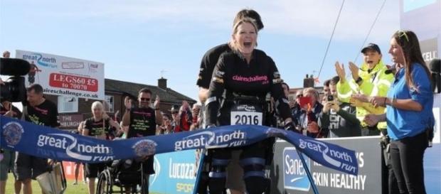 Huge crowds cheered as Claire Lomas completed the half marathon in South Shields, U.K. Huge crowds cheered as Claire Lomas completed the half marathon in South Shields, U.K.