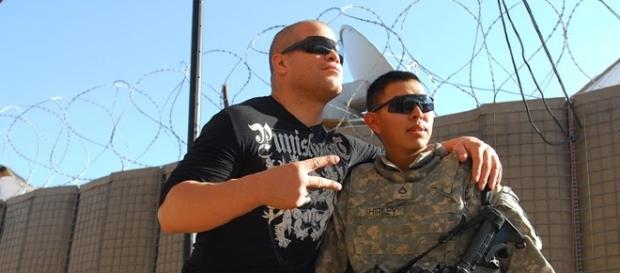 Tito Ortiz (left) poses with a soldier in this photo from 2009. Photo c/o Wikimedia Commons. Tito Ortiz (left) poses with a soldier in this photo from 2009. Photo c/o Wikimedia Commons.