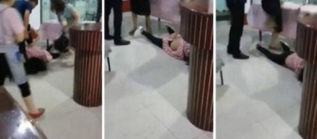 Mulher apanha de esposas irritadas Mulher apanha de esposas irritadas