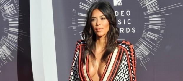 Kim Kardashian and her breast - inquisitr.com Kim Kardashian and her breast - inquisitr.com