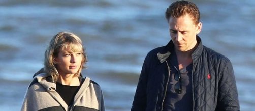 Taylor Swift, Tom Hiddleston Hold Hands on Beach in England - Us ... - usmagazine.com