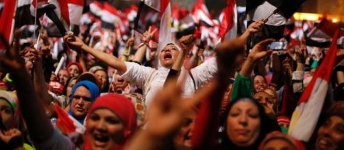 Egyptians react to the army's announcement in Tahrir Square - ABC ... - net.au
