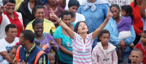 Churchgoers calling upon divine help against gangsters Picture: Fu'ad trahman. Churchgoers calling upon divine help against gangsters Picture: Fu'ad trahman.