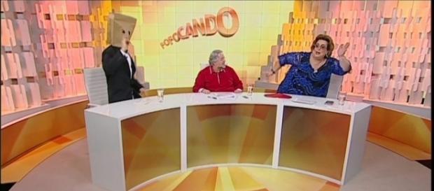 Leão Lobo, Mama Bruschetta e Homem do Saco apresentando o Fofocando - Reprodução/SBT Leão Lobo, Mama Bruschetta e Homem do Saco apresentando o Fofocando - Reprodução/SBT