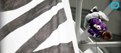 Pipeline Opponents Unfurl Giant Banner During Football Game