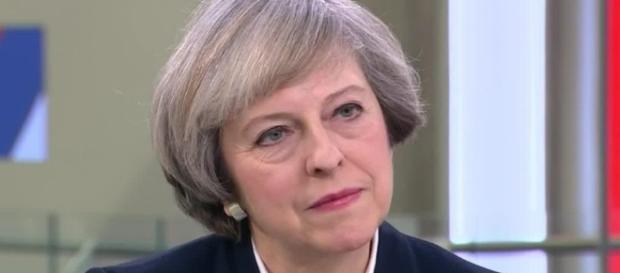 Theresa May gives icy glare as she condemns Donald Trump's ... - thesun.co.uk Theresa May gives icy glare as she condemns Donald Trump's ... - thesun.co.uk