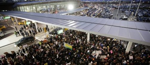 Protesters converge at U.S. airports to oppose President Trump's immigration ban. courtesy of Justin Lane/ via European Press photo Agency