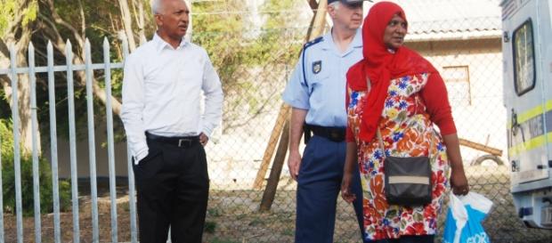 ON GANGSTER HIT LIST -- police chief Colonel Fanie Scanel with two community workers who are threatened with death by gabgsters ON GANGSTER HIT LIST -- police chief Colonel Fanie Scanel with two community workers who are threatened with death by gabgsters