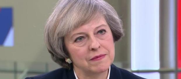 Theresa May gives icy glare as she condemns Donald Trump's ... - thesun.co.uk Theresa May gives icy glare as she condemns Donald Trump's ... - thesun.co.uk