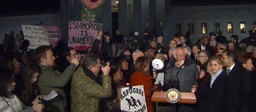Bernie Sanders and fellow democrats protest President Trump's travel ban outside the Supreme Court courtesy of Megan Yoder/ via ABC News Fair Use