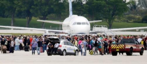 People evacuated from terminal after shooter opens fire at Ft. Lauderdale Airport - photo via abcnews.com
