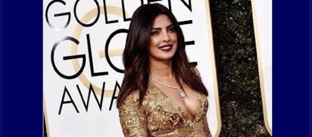 Priyanka on the red carpet at the Golden Globe awards, screencap from @jazmasri via Twitter Priyanka on the red carpet at the Golden Globe awards, screencap from @jazmasri via Twitter