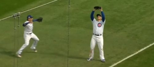 Anthony Rizzo squeezes the final out of Game 3 against the Nationals. [Image via Green Mode/YouTube]