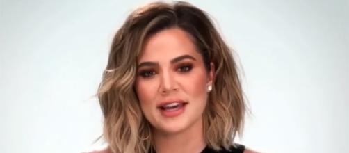 Khloe Kardashian stays silent about the pregnancy rumors surrounding her and her sisters. (Entertainment Tonight/YouTube)