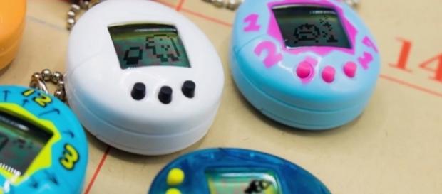 The old beeping attention-grabbers are back as Bandai releases the 20th anniversary Tamagotchi in the US next month. | Credit (IGN/YouTube) The old beeping attention-grabbers are back as Bandai releases the 20th anniversary Tamagotchi in the US next month. | Credit (IGN/YouTube)