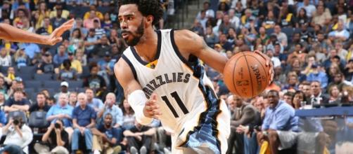 Mike Conley and the Grizzlies host the Houston Rockets in a Wednesday night preseason game. [Image via NBA/YouTube]