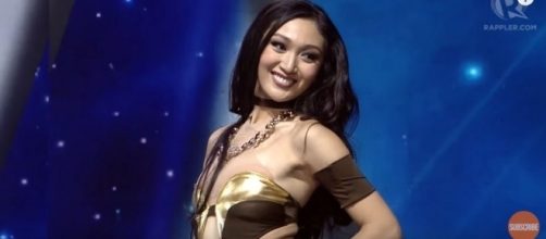 The delegate from the Philippines wearing her swimsuit attire. [Image Credit/Rappler/YouTube]