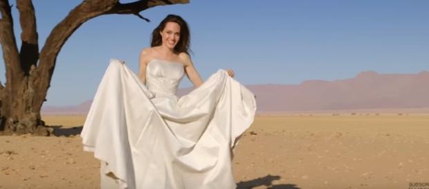 Angelina Jolie poses for Harper's Bazaar magazine cover with the cheetahs. YouTube/HarpersBazaar Angelina Jolie poses for Harper's Bazaar magazine cover with the cheetahs. YouTube/HarpersBazaar