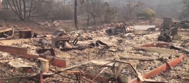 Homes gone to ashes after scorching wildfires. Image Credit: Guardian News/ Youtube screencap Homes gone to ashes after scorching wildfires. Image Credit: Guardian News/ Youtube screencap