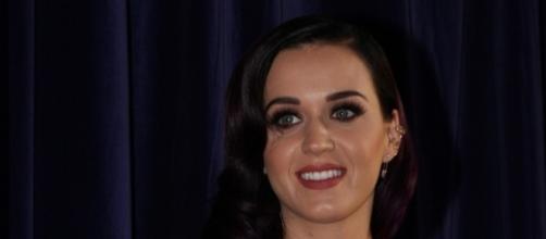 Katy Perry poses for a photograph. [Image Credit: Eva Rinaldi/Flickr]