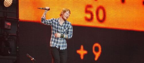 Ed Sheeran performing live at Wembley Stadium. [Image Credit: Mark Kent/ Flickr]