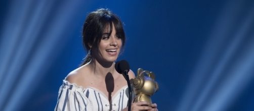Camila Cabello accepts award. [Image Credit: Disney ABC Television/Flickr]