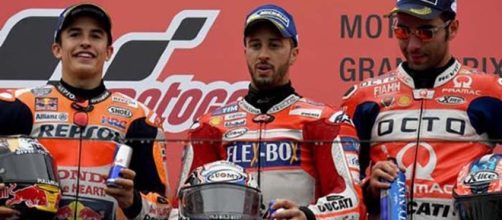 Il podio in Giappone: da sinistra Marquez, Dovizioso e Petrucci