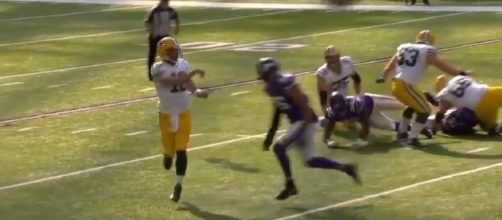 Packers quarterback Aaron Rodgers shown after releasing the ball and before he was hit. -- YouTube screen capture / ESPN