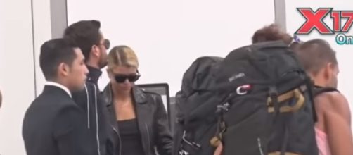 Scott Disick and Sofia Richie spotted in Los Angeles Airport as they headed off to Milan, Italy. [Image Credit: YouTube/X17onlinevideo]