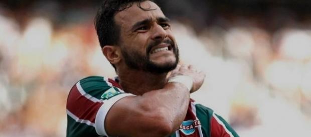 Com a camisa do Fluminense, Henrique Dourado vem atravessando um bom momento na carreira (Foto: Blogspot) Com a camisa do Fluminense, Henrique Dourado vem atravessando um bom momento na carreira (Foto: Blogspot)