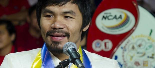 Manny Pacquiao leaves Top Rank guessing on whether he will fight or retire/ photo by inboundpass/ Flickr Manny Pacquiao leaves Top Rank guessing on whether he will fight or retire/ photo by inboundpass/ Flickr