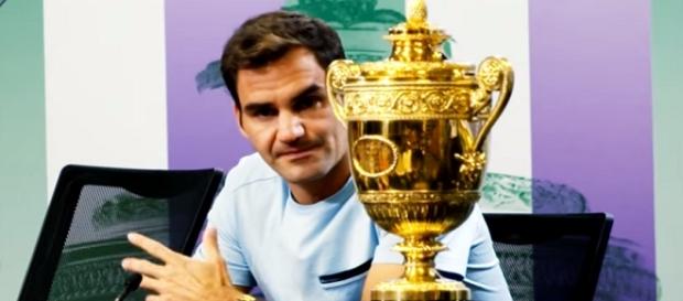 Roger Federer and his eighth Wimbledon trophy/ Photo: screenshot via ATPWorldTour channel on YouTube Roger Federer and his eighth Wimbledon trophy/ Photo: screenshot via ATPWorldTour channel on YouTube