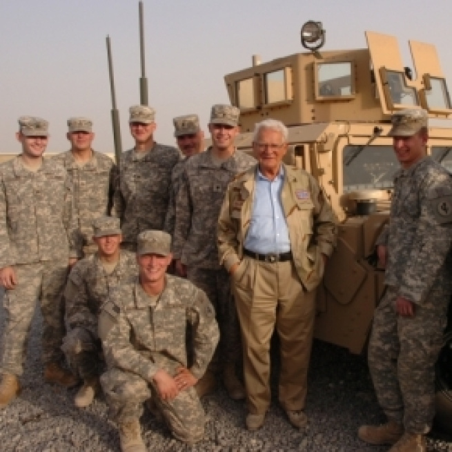 Easy Company WWII veteran Donald Malarkey visiting US troops in Iraq, 2008. (Photo Credit: Charles Mekin/Wikimedia Commons)