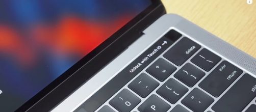 Apple's newest laptop features a touch bar which includes a multitude of features. [Image via SlashGear/YouTube screencap]