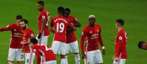 Manchester United players celebrate Marcos Rashford's goal in the 2-0 victory over Leicester City. (Image Credit: Ian Johnson/Flickr)