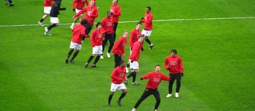 Players of Manchester United prematch warmup (Photo Image: UEFA/Wikimedia Commons)