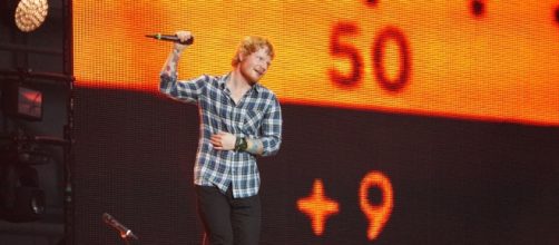 Ed Sheeran performing at Wembley. [Image Credit: Mark Kent/Flickr]