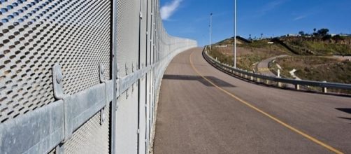 Border Fence near San Diego (Image credit - Josh Denmark – Wikimedia Commons)
