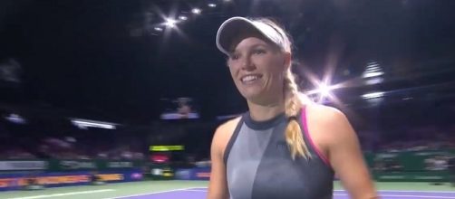 Caroline Wozniacki celebrates her win in Singapore. [Image Credit: WTA/YouTube]