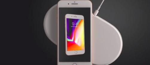 Wireless charging looks and sounds amazing but doesn't ease charging problems. [Image via Apple/YouTube]