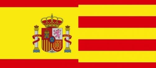 Flag of Spain in the left, flag of Catalonia on the right [Image by Galifardeu|Wikimedia Commons| Cropped and Resized | public domian ]