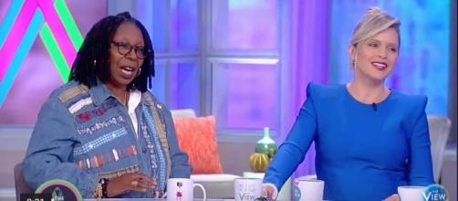 Whoopie Goldberg and Sara Haines discussing Ellen DeGeneres' tweet. Image courtesy of The View's Youtube