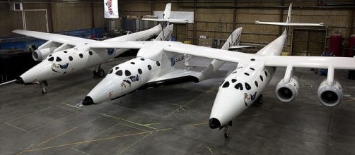White Knight Two with SpaceShipTwo attached [Image via Virgin Galactic/Mark Greenberg wikimedia commons]