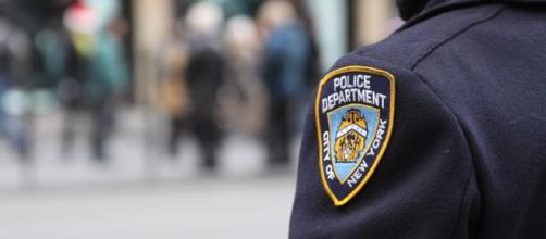 2 NYPD officers are facing rape charges for raping an 18-year-old drug suspect. [Image credit: Dave Hosford/Flickr]