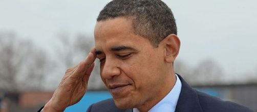 Former President Obama salutes at Andrews Air Base.[image credit;Pete Souza/Wikimedia Commons]