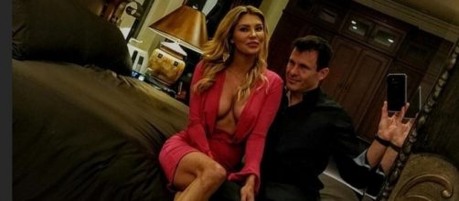 Brandi Glanville poses in bed with Donald "DJ" Friese. [Photo via Instagram]