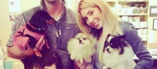 Farrah Abraham poses with a friend and a couple of dogs. [Photo via Instagram]
